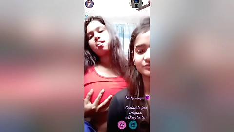 Hot brunette in a sexy bikini playing with her natural breasts