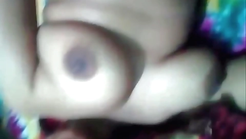 Amateur brunette with large tits stretching her legs