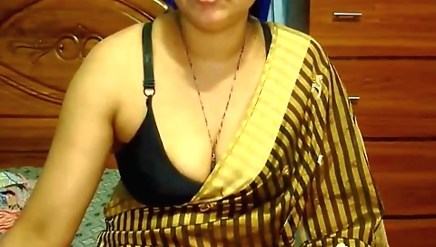 Gorgeous indian babe shows off her nice face and tits