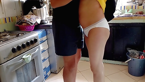 Housemaid with a shaved pussy shows off her natural beauty