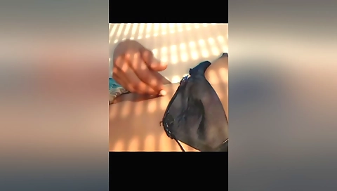 Solo female video showing her smooth face and tits