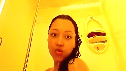 Busty amateur brunette in a bath is getting her holes full