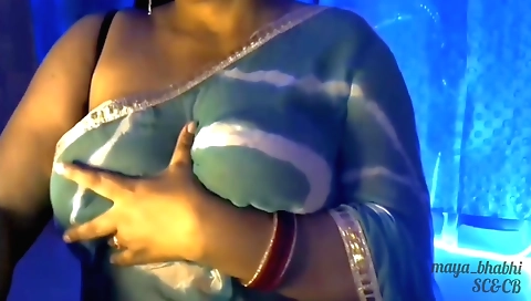 Bhabhi is wearing a sexy bikini and showing off her boobs