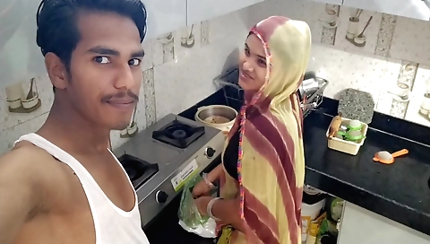 Indian housewife cooking in homemade kitchen video