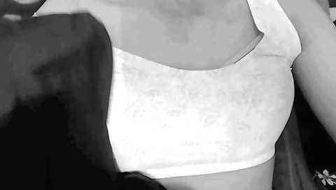 Solo female in yellow hoodie naked in her living room