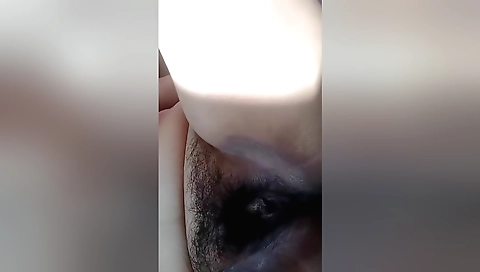 Solo female shows us how she handles her hair and moans