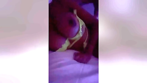 Amateur brunette is making a webcam video with a great look