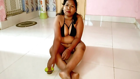 Housewife rubs her pussy and fingers in the living room