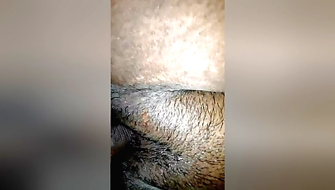 Indian hairy pussy with a camera playing with its cunt