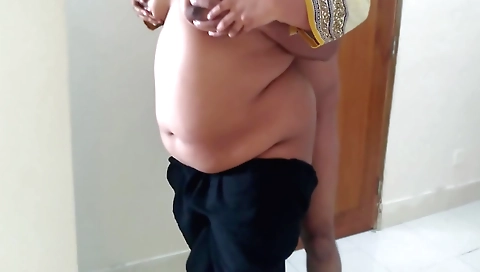 Busty babe in black dress and tights shows her huge boobs 07a