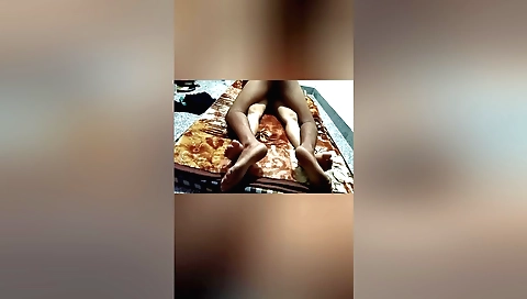 Amateur indian girl rides in her black motorbike with food