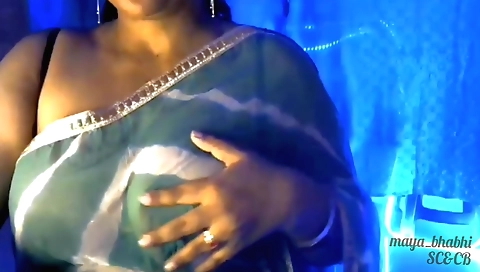 Amateur female with big tits shows off her large boobs on web cam