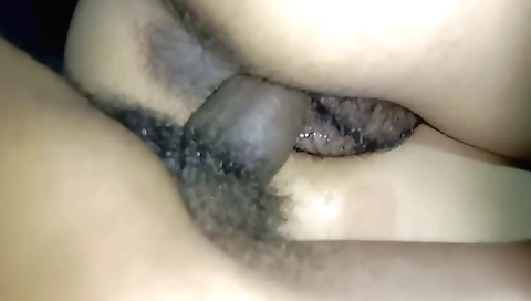 Indian girl in sexy bikini is playing with a dildo