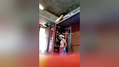 Bhabhi wearing changing clothes and showing herself off on a couch