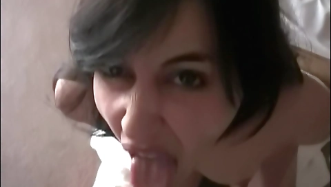 Hot brunette amateur in a hotel room is sitting on her knees