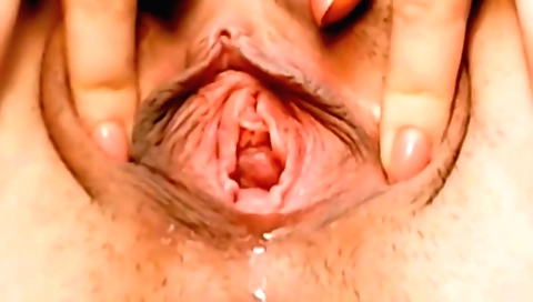 Solo amateur video shows a hot brunette making love