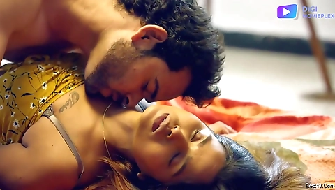 A hot brunette in a sexy dress and stockings is getting cumming