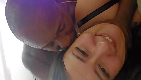 A teen 18+ brunette with big tits is having sex with a black guy