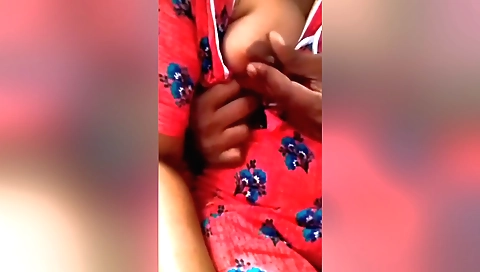 Indian brunette in a sexy white bikini and black tank top