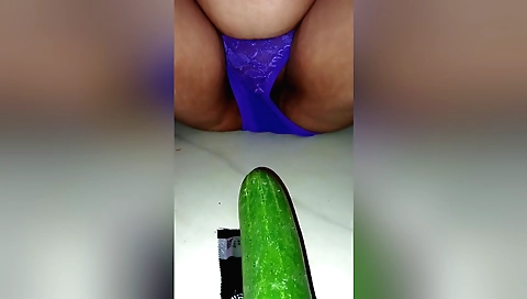 Indian girl with small tits using cucumber to get wet pussy