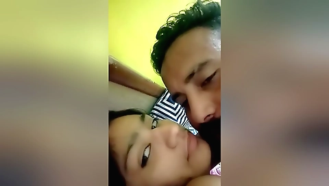 Porn video of a brunette girl showing her beauty in the room