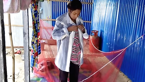 Solo female in sexy lingerie takes off her panties