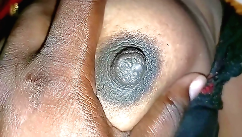 Indian woman in a white dress and sexy dress is giving a great blowjob