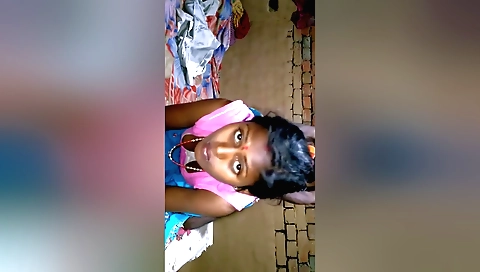 Indian girl is showing off her natural breasts in her bedroom